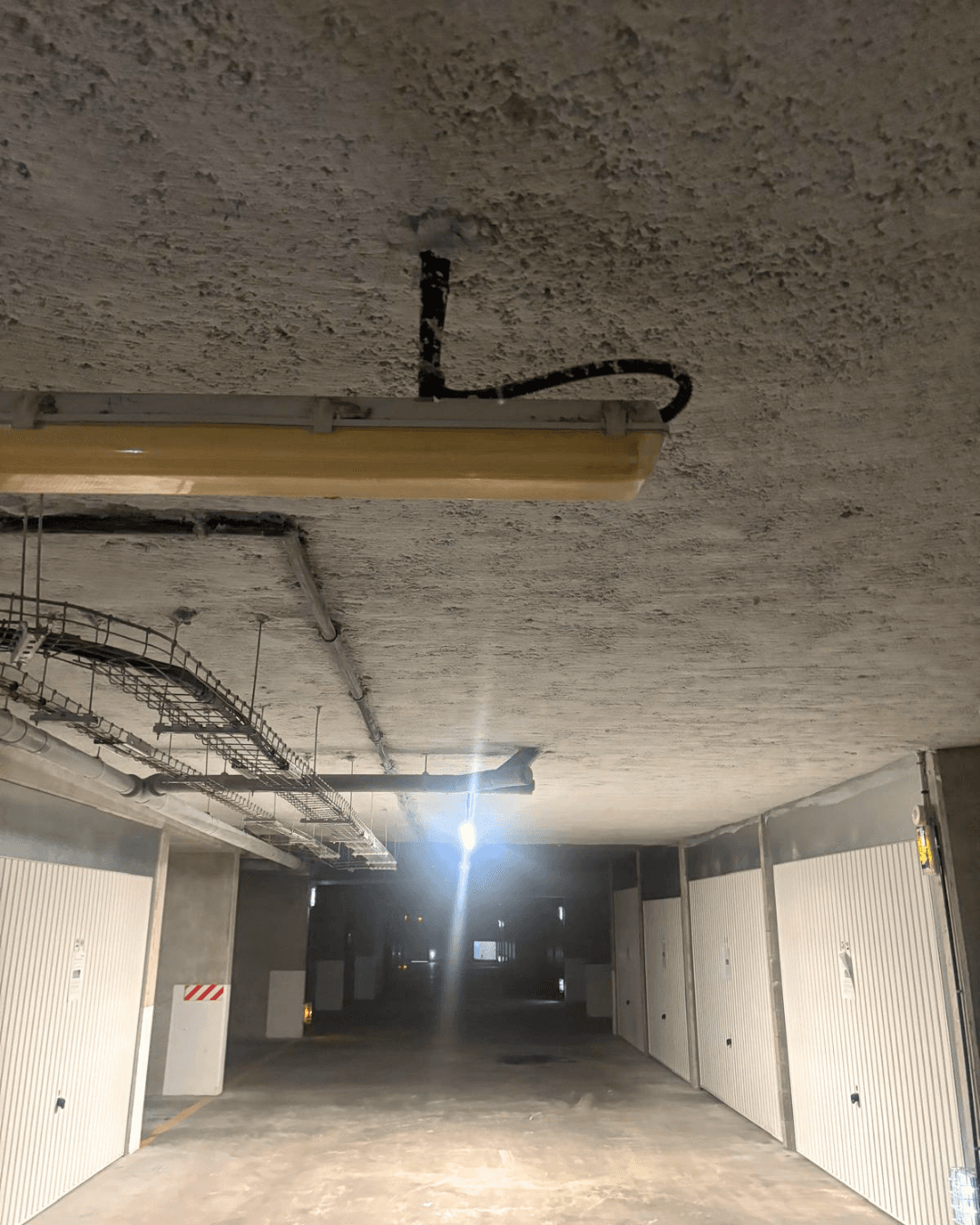 Flocage thermique d'un plafond de parking en copropriété — Saint-Germain-en-Laye (78)